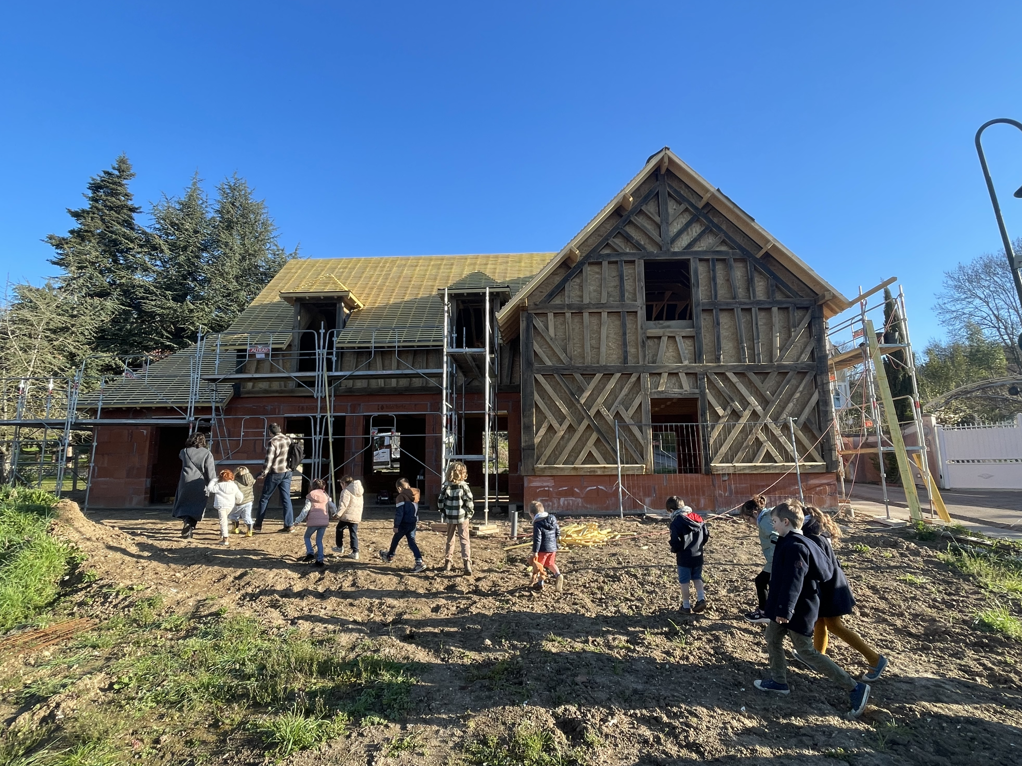 Maison écologique en bardage bois dans son jardin — VAL Architecture